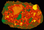 Pseudocolored 3D reconstructions of suevite LB-39c from the Bosumtwi Crater, Ghana. Matrix is red, rock clasts are yellow/orange and melt clasts (and edge of sample) are blue/green. (Sample courtesy of Dr. Christian Koeberl, University of Vienna). Above, all phases fully opaque.